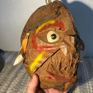 Handcrafted Tribal Mask with Colorful Accents made from coconut